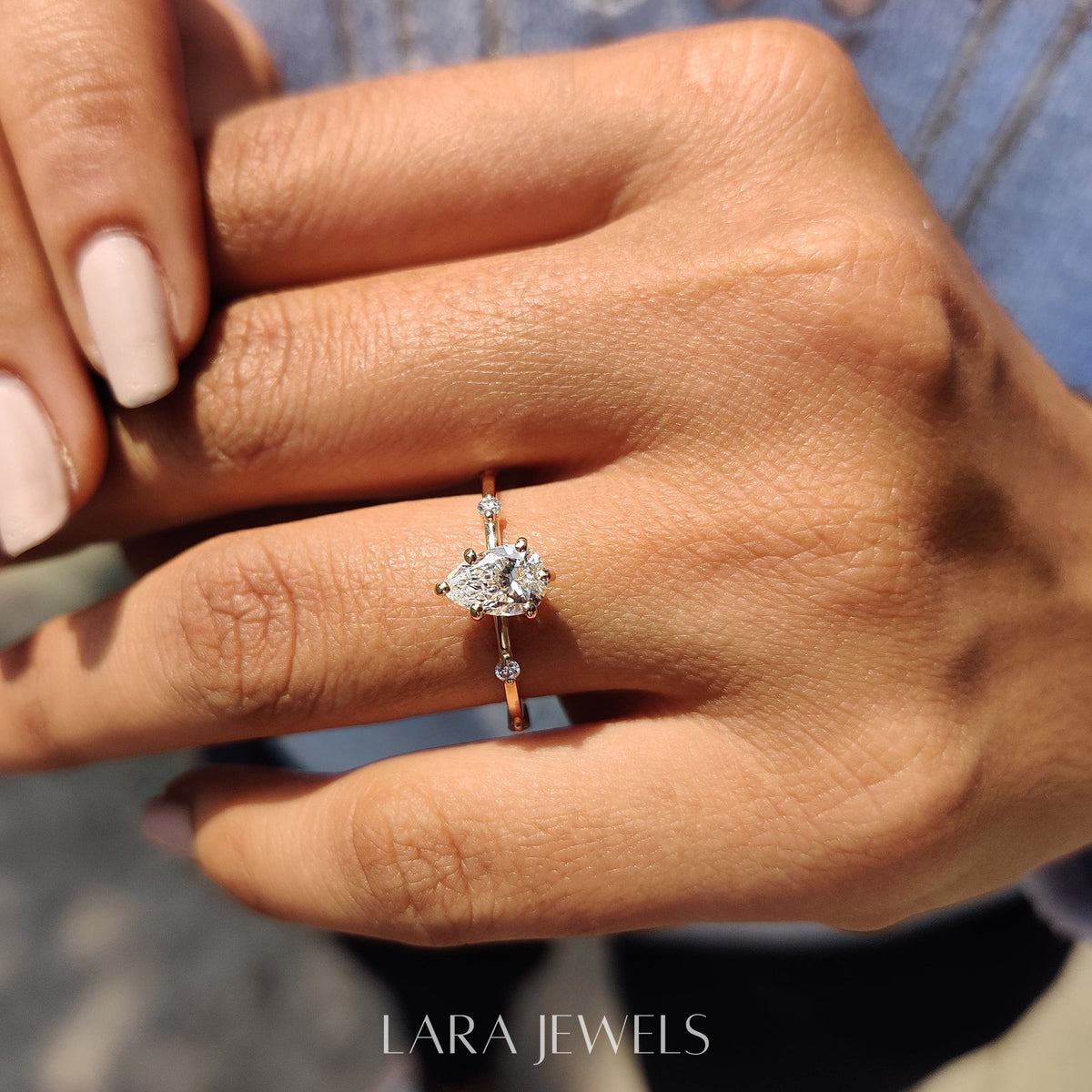 Lab grown pear engagement ring in Lara Jewels setting, available in Silver. IGI certified, ethically sourced, handcrafted at Lara Jewels.
