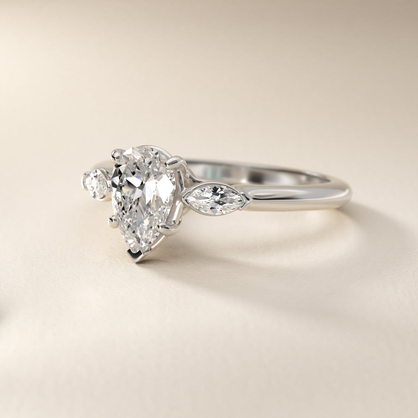 Marquise Cut Diamond Three Stone Engagement Ring In 14K White Gold By James Allen - Pear Center