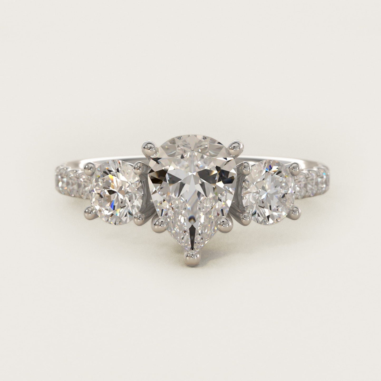 Modern Trellis Three Stone Diamond Engagement in 18k White Gold - Pear Center