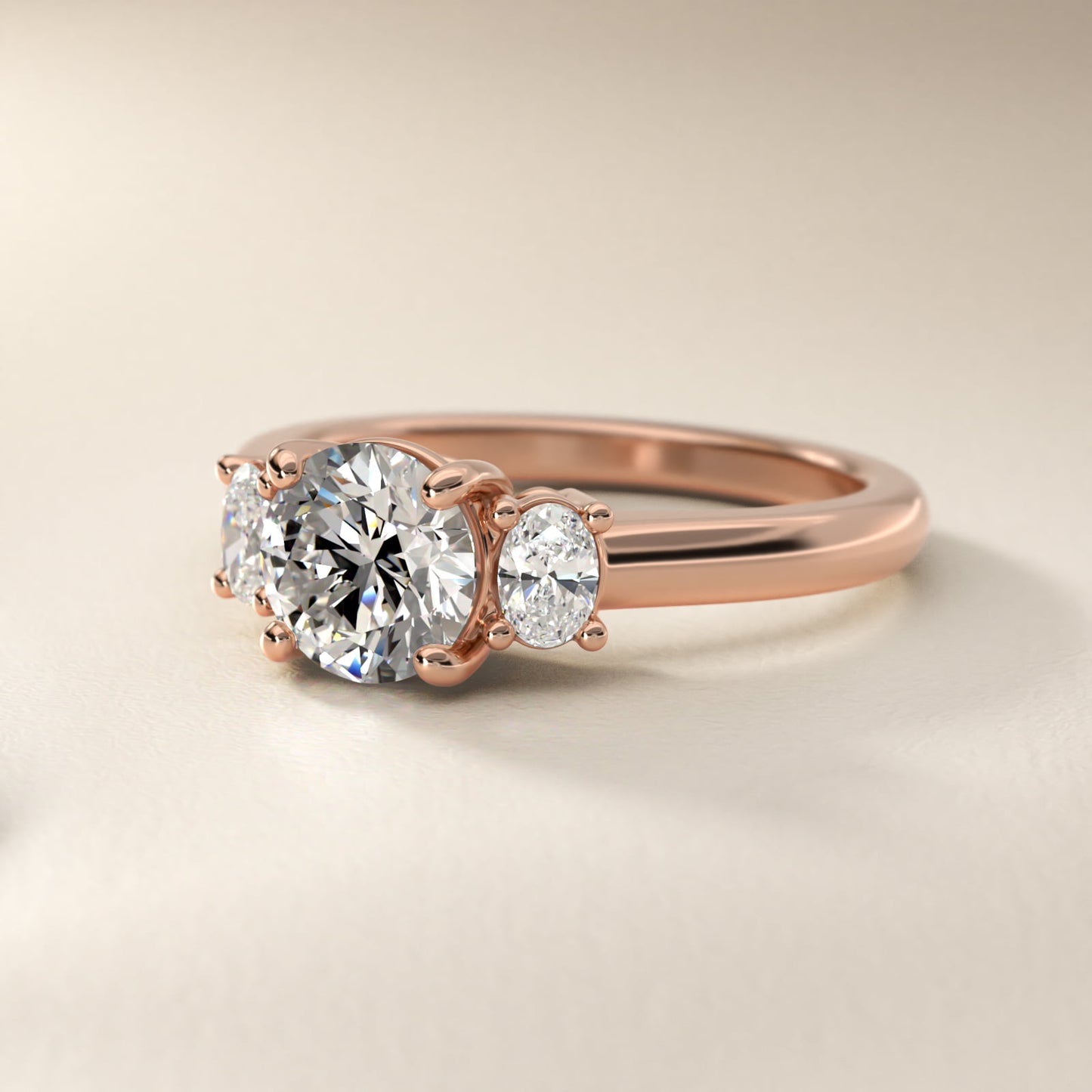Oval Three-Stone Diamond Engagement Ring in 14k Rose Gold (1/3 ct. tw.) - Round Center