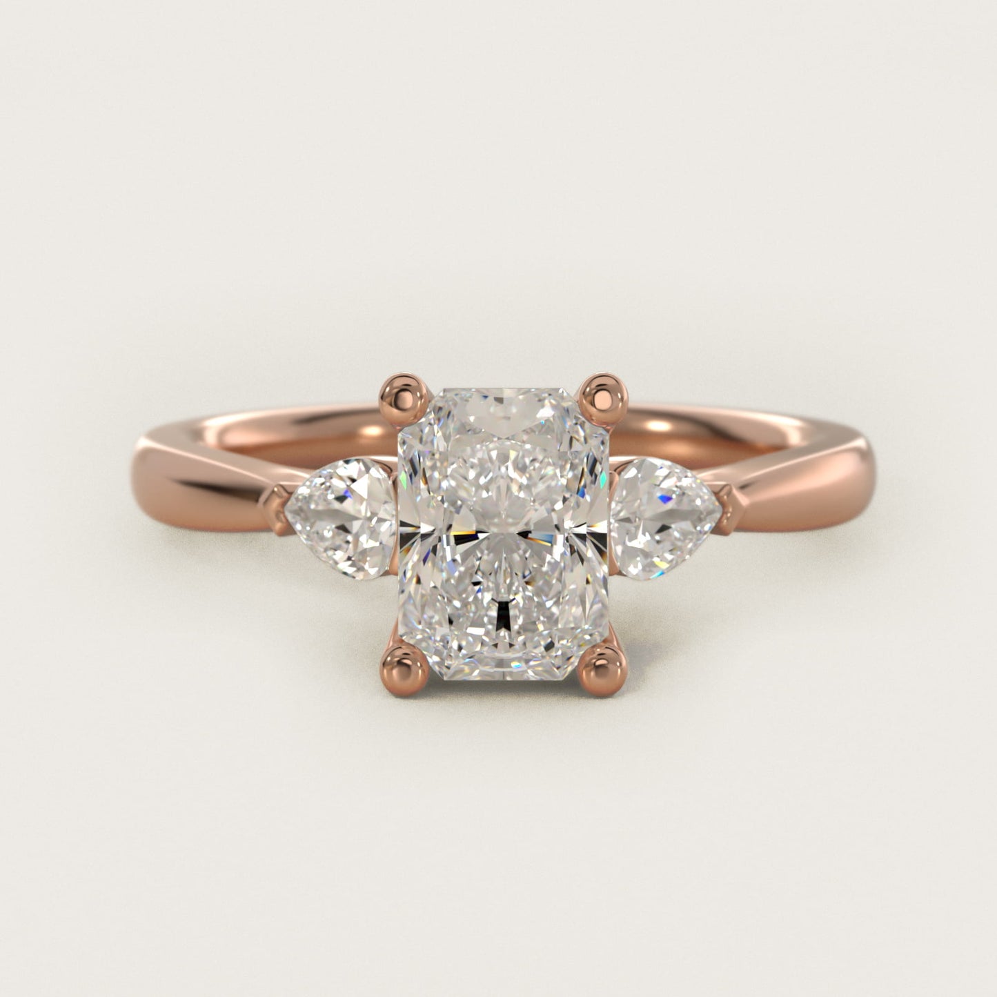 Pear Sidestone Diamond Engagement Ring in 18k Rose Gold (1/4 ct. tw.) - Radiant Center