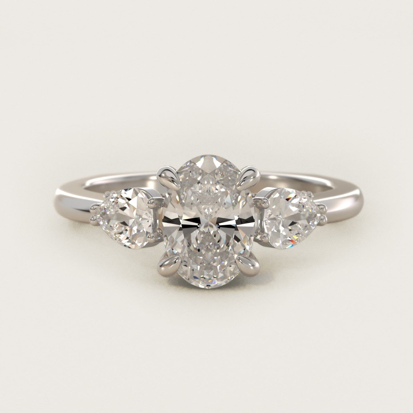 Pear Three Stone Engagement Ring in 18k White Gold (5/8 ct. tw.) By Bella Vaughan - Oval Center