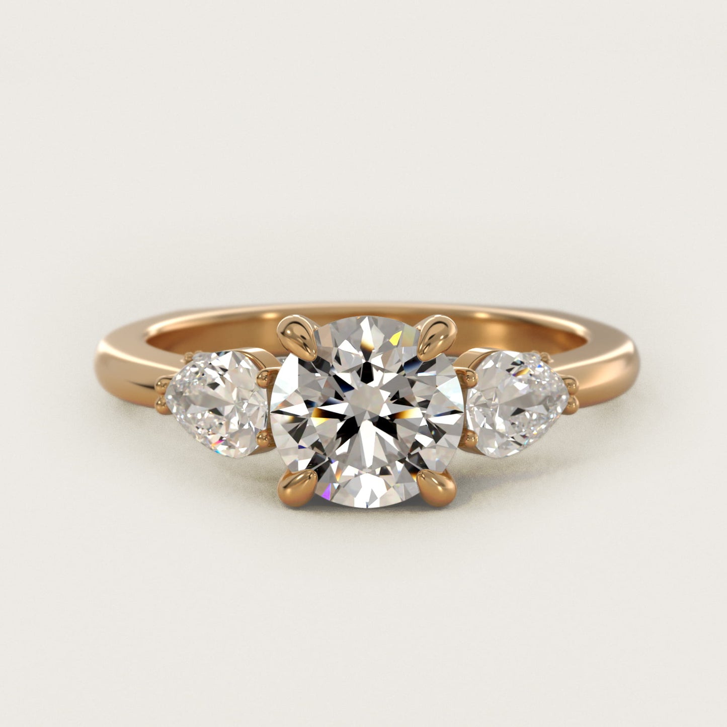 Pear Three Stone Engagement Ring in 14K Yellow Gold (5/8 ct. tw.) By Bella Vaughan - Round Center