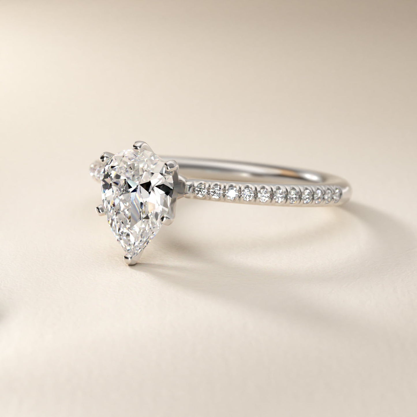 Petite MicropavŽ Diamond Engagement Ring in 18k White Gold (1/10 ct. tw.) - Pear Center