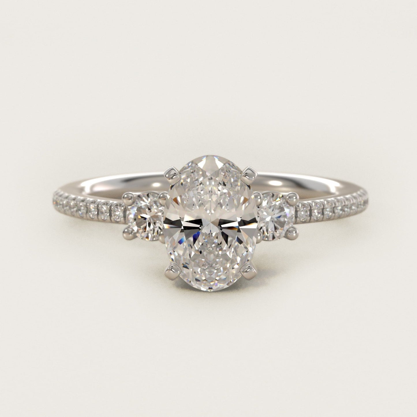 Petite Micropav? Trio Diamond Engagement Ring in Platinum (1/5 ct. tw.) - Oval Center