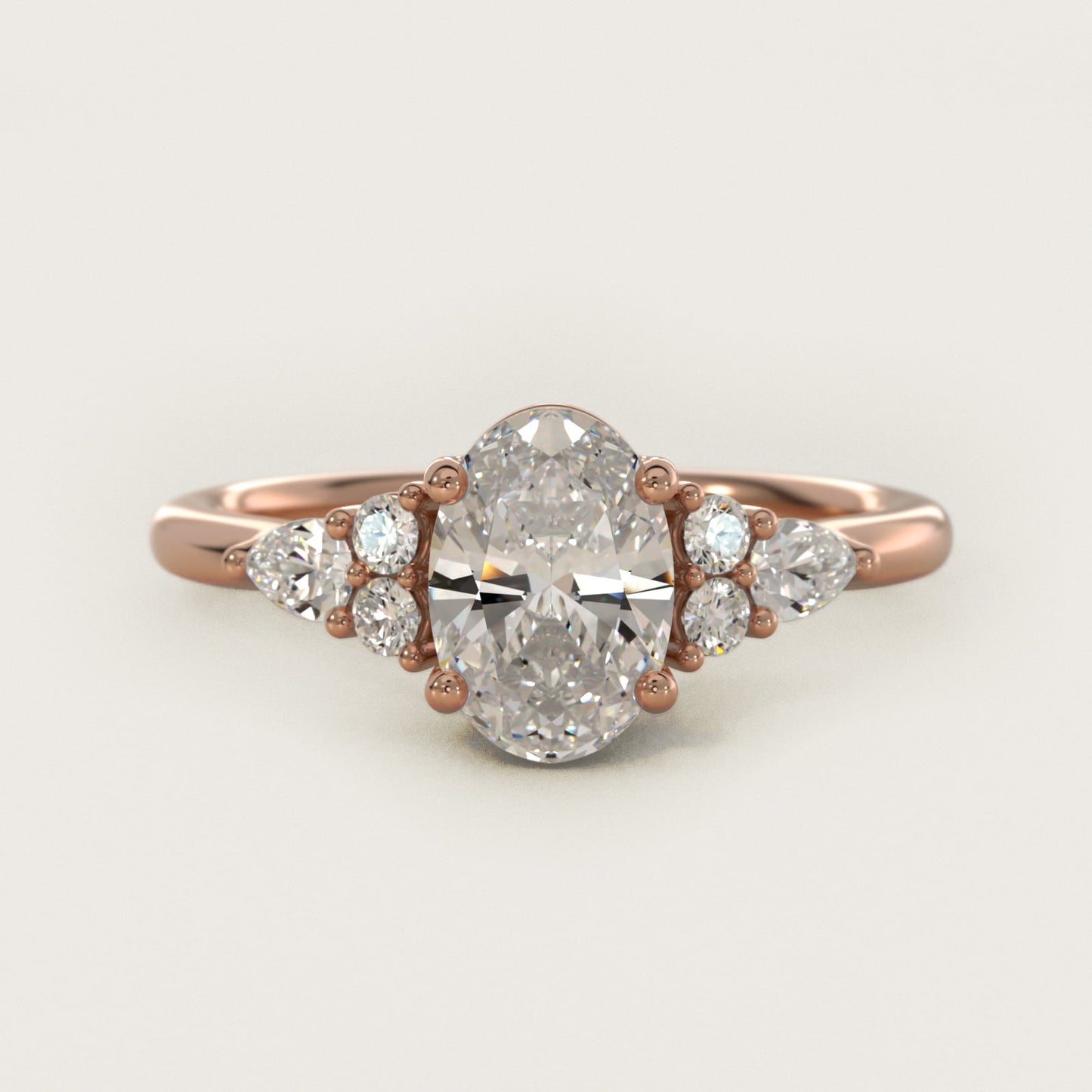 Petite Pear and Round Diamond Engagement Ring in 14k Rose Gold (1/4 ct. tw.) - Oval Center