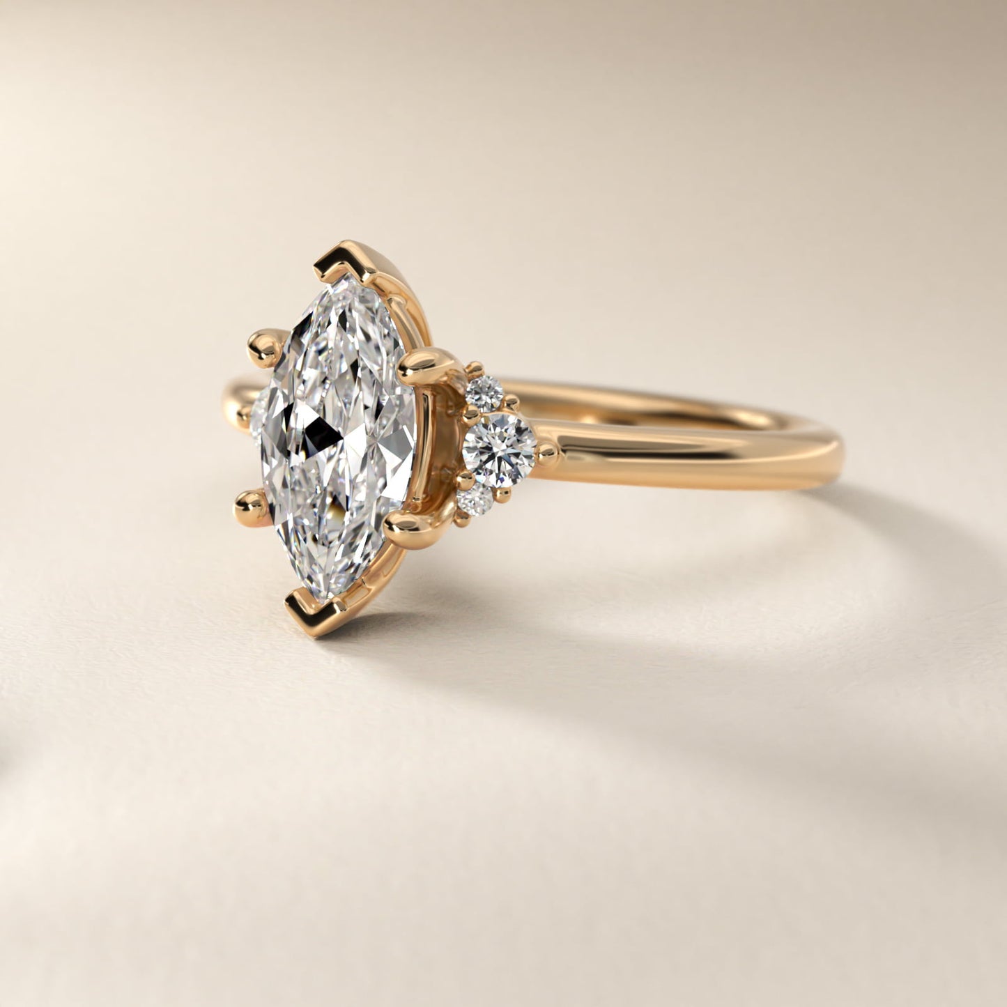 Petite Three Diamond Engagement Ring in 14k Yellow Gold (1/10 ct. tw.) - Marquise Center