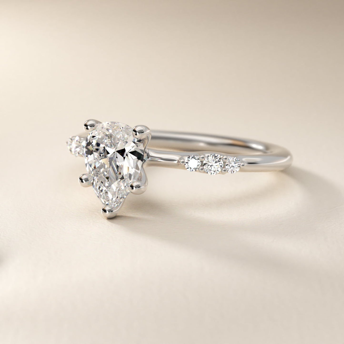 Petite Three Round Diamond Accents Side Stone Engagement Ring In 14K White Gold By James Allen - Pear Center