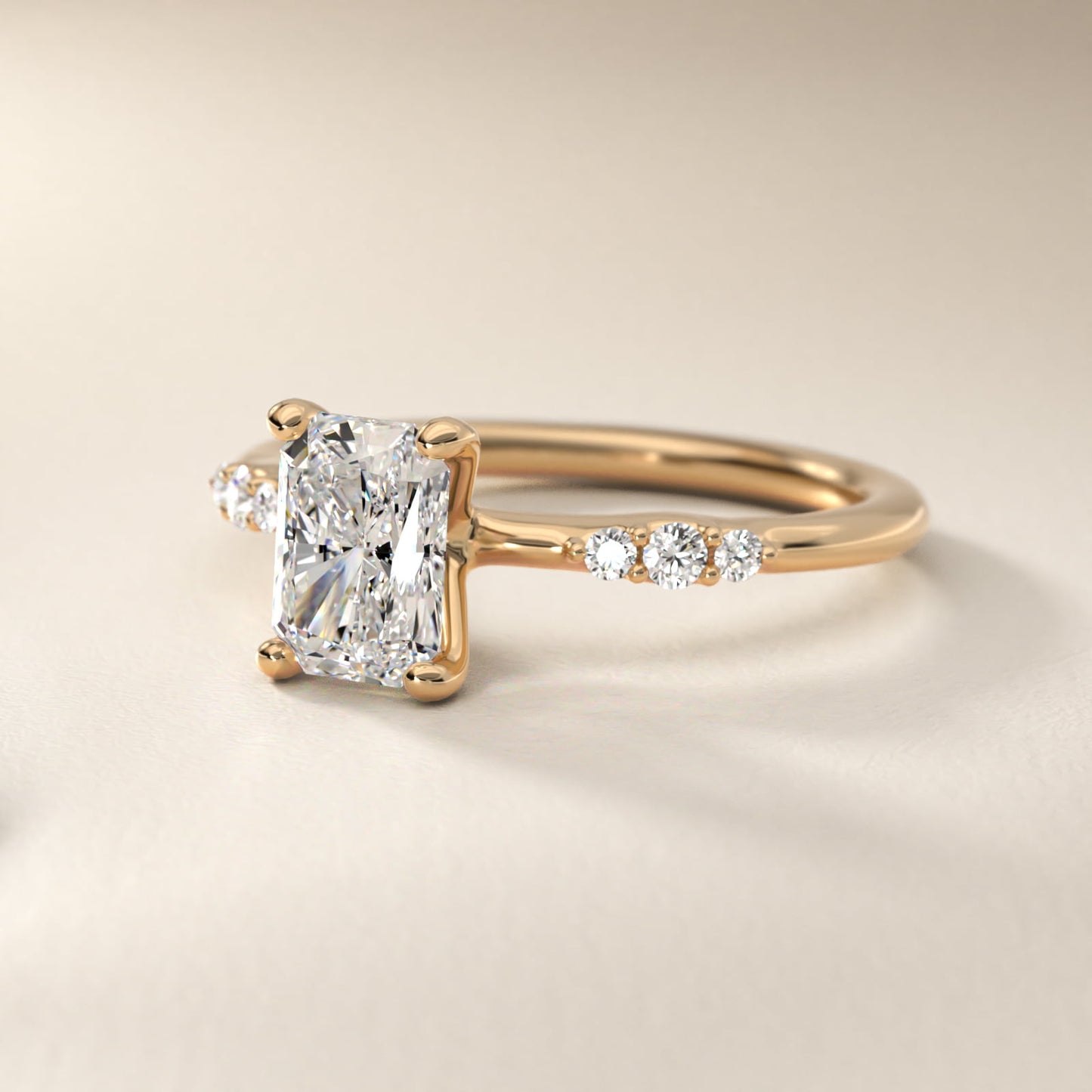 Petite Three Round Diamond Accents Side Stone Engagement Ring In 14K Yellow Gold By James Allen - Radiant Center