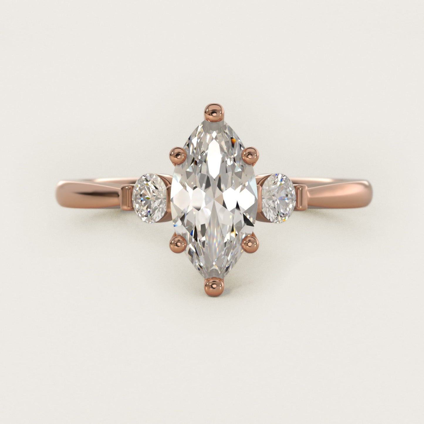 Petite Three-Stone Diamond Engagement Ring in 14k Rose Gold - Marquise Center