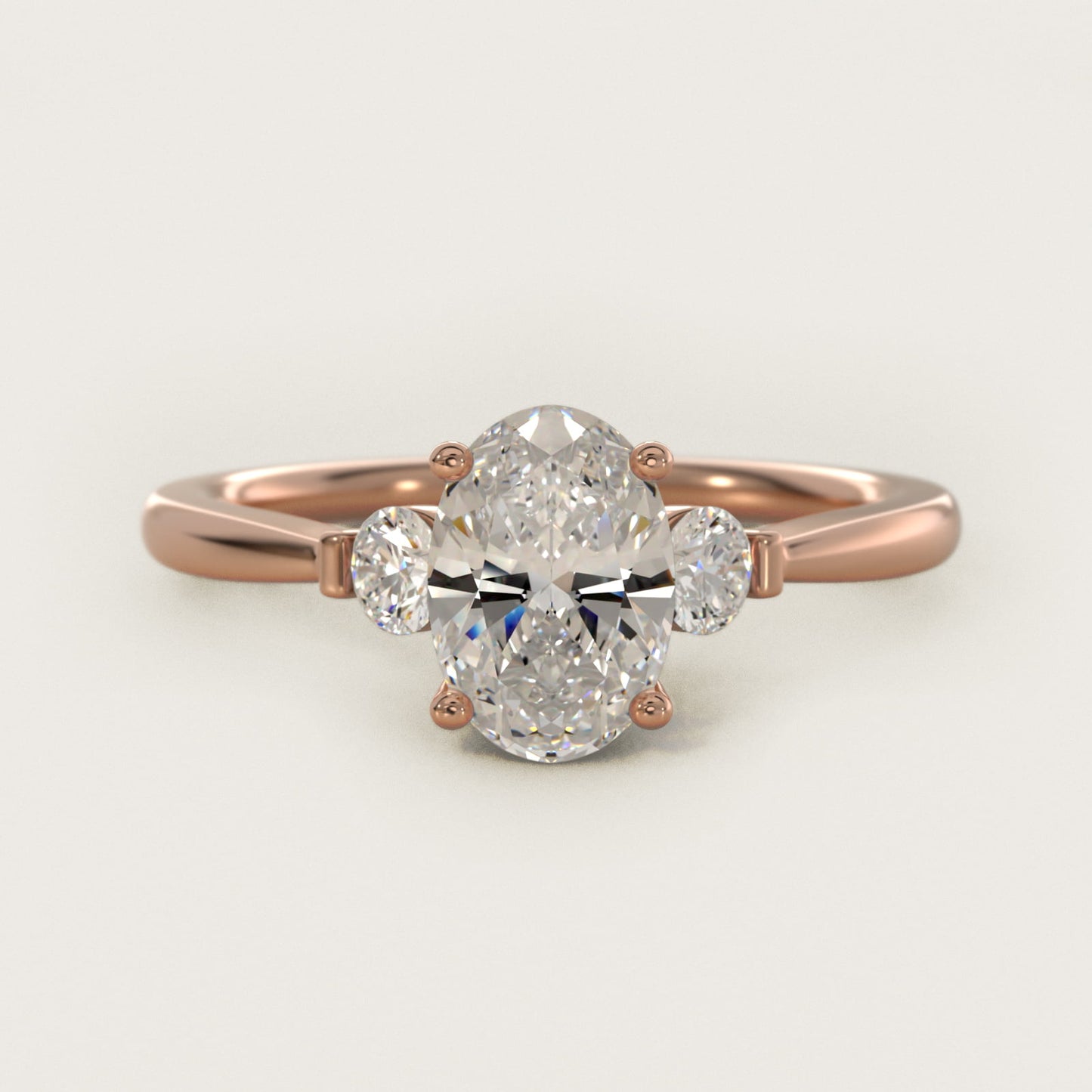 Petite Three-Stone Diamond Engagement Ring in 18k Rose Gold - Oval Center