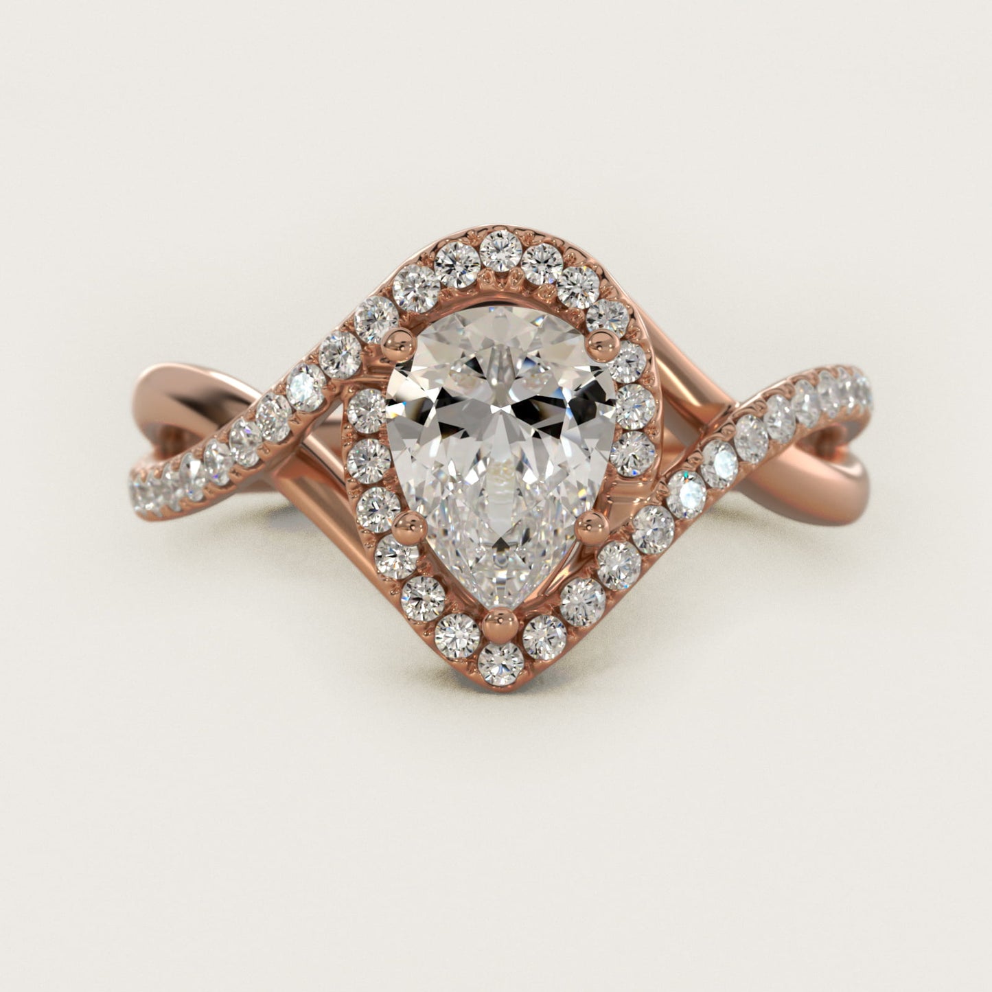 Petite Twisted Halo Diamond Engagement Ring in 18k Rose Gold (1/4 ct. tw.) - Pear Center
