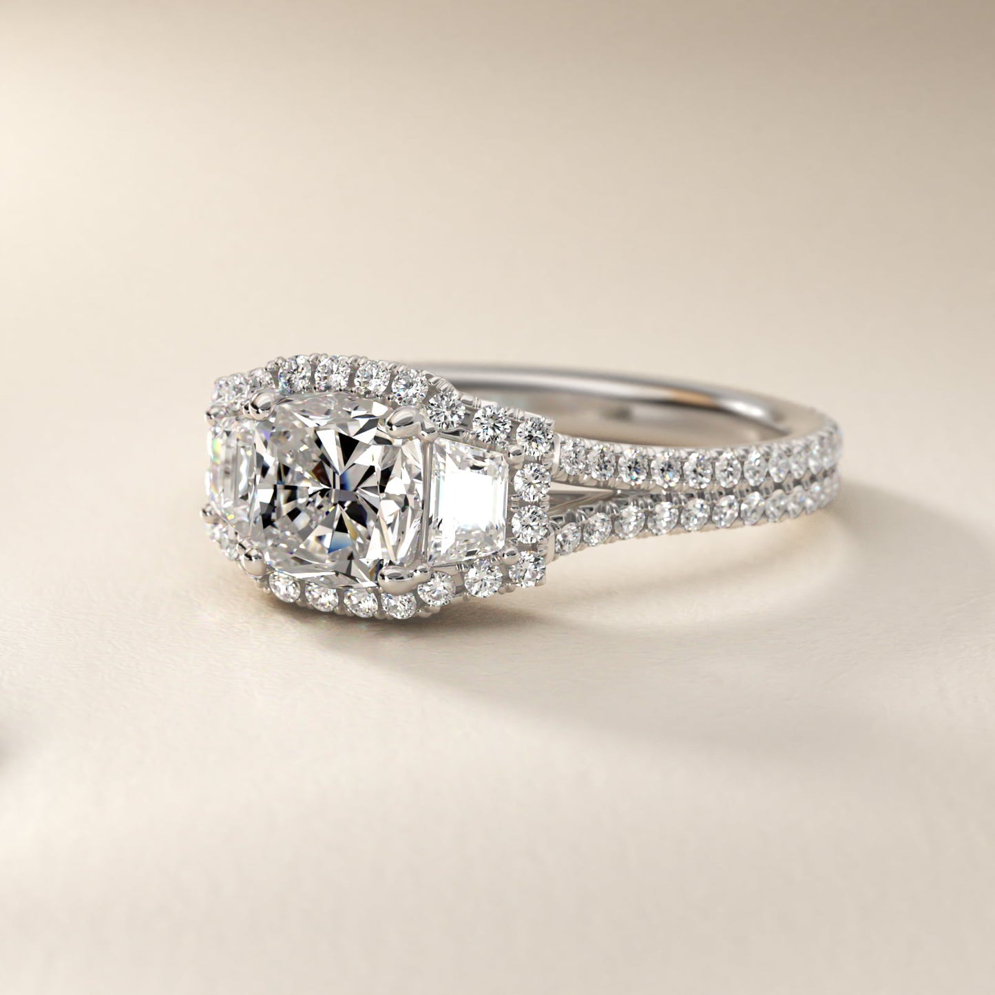The Gallery Collection™ Emerald Three Stone Halo Diamond Engagement Ring in Platinum - Cushion Center