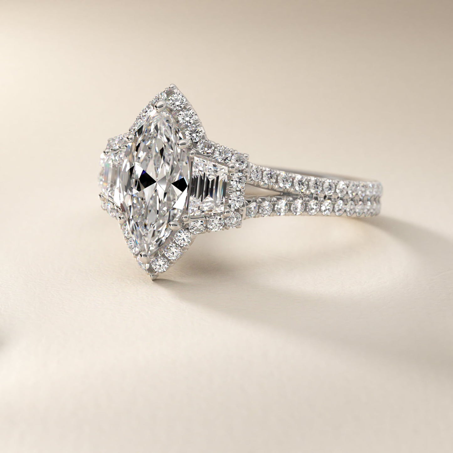 The Gallery Collection™ Emerald Three Stone Halo Diamond Engagement Ring in Platinum - Marquise Center