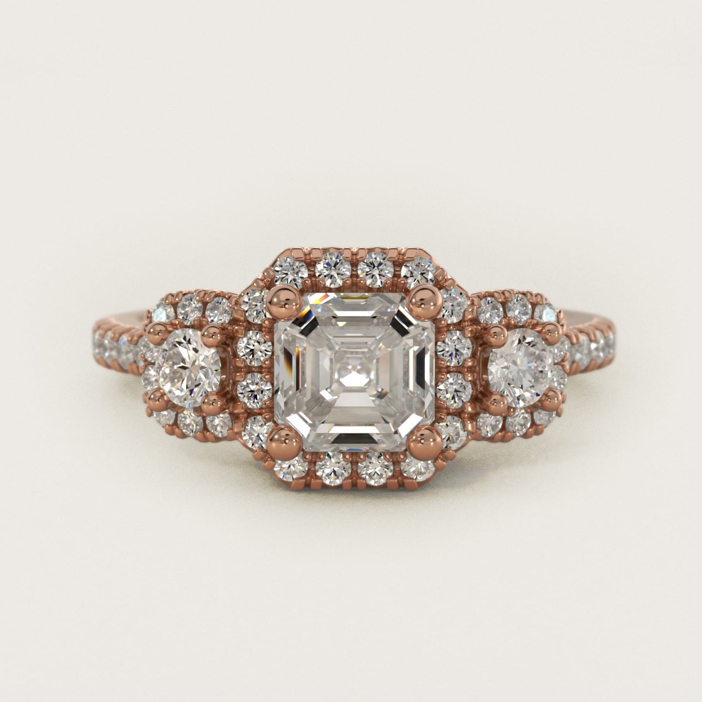 Three-Stone Cushion Halo Diamond Engagement Ring in 14k Rose Gold - Asscher Center