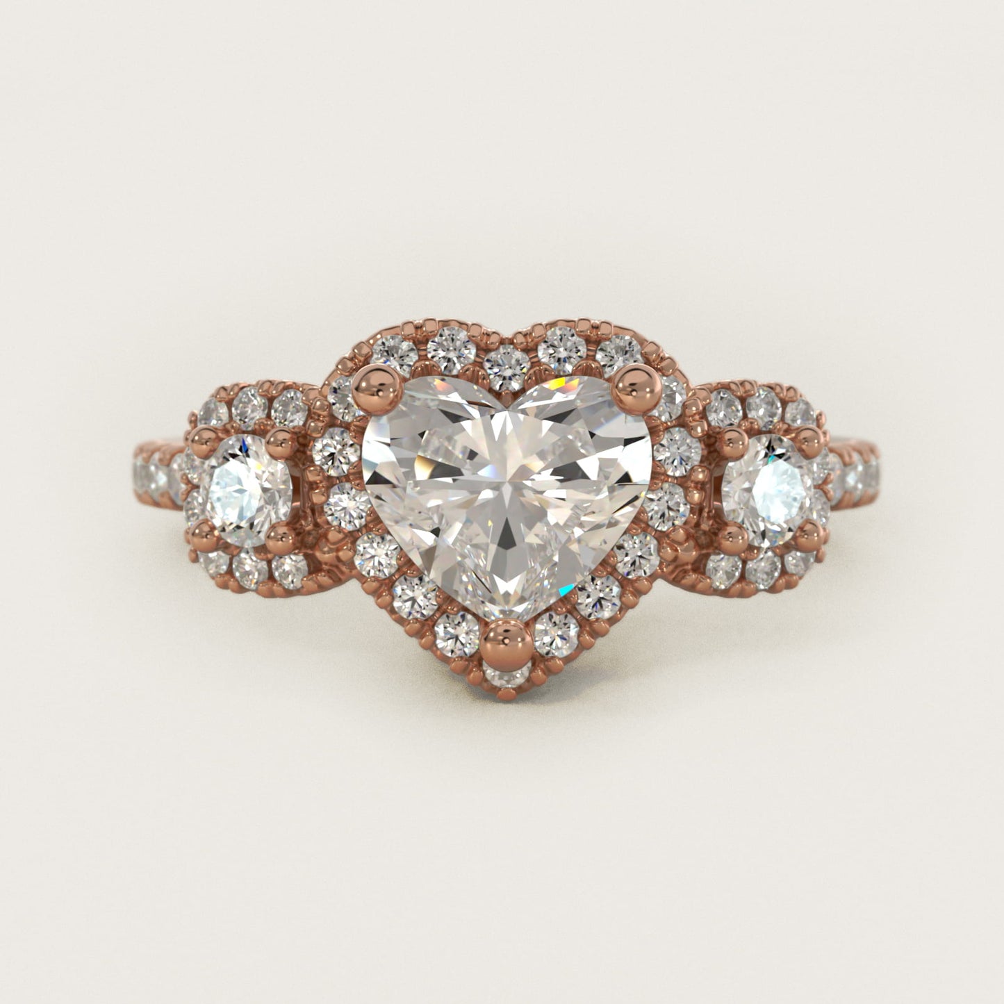 Three-Stone Cushion Halo Diamond Engagement Ring in 14k Rose Gold - Heart Center