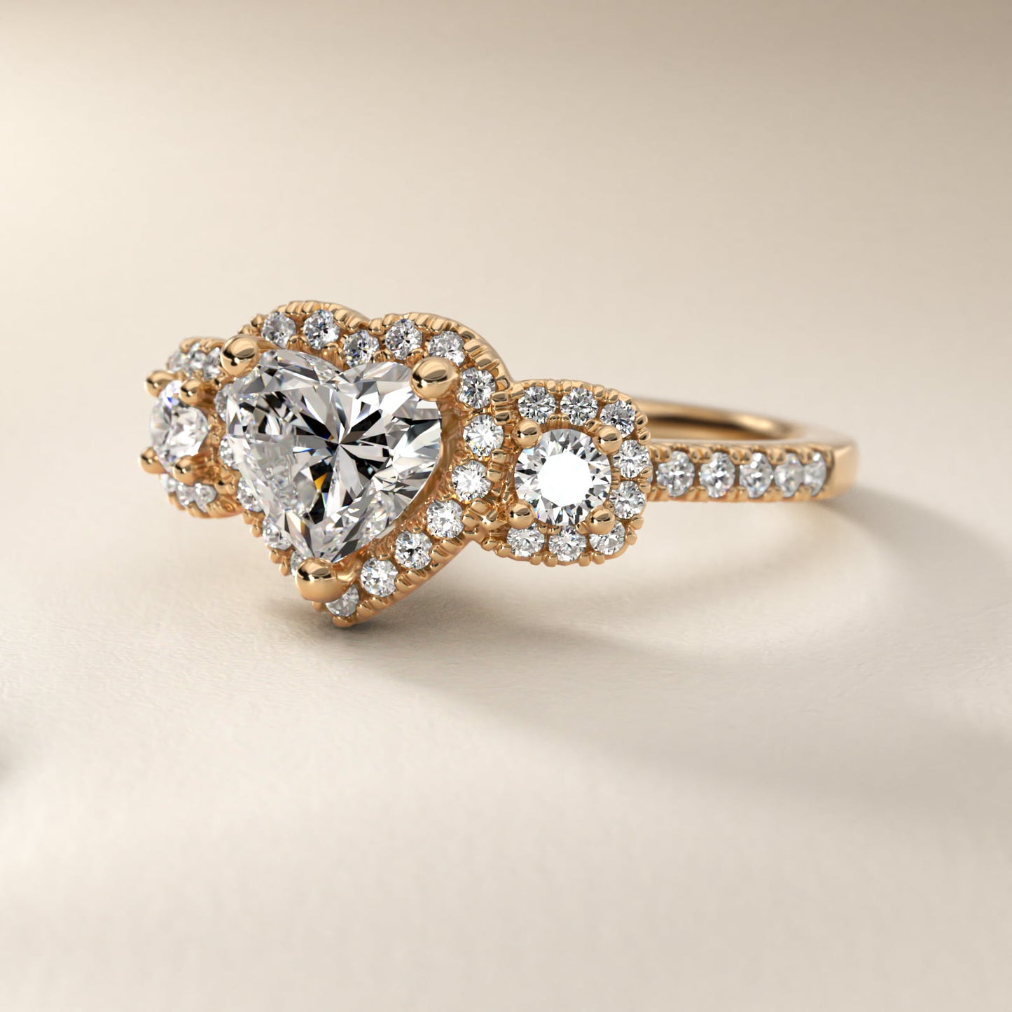 Three-Stone Cushion Halo Diamond Engagement Ring in 14k Yellow Gold - Heart Center