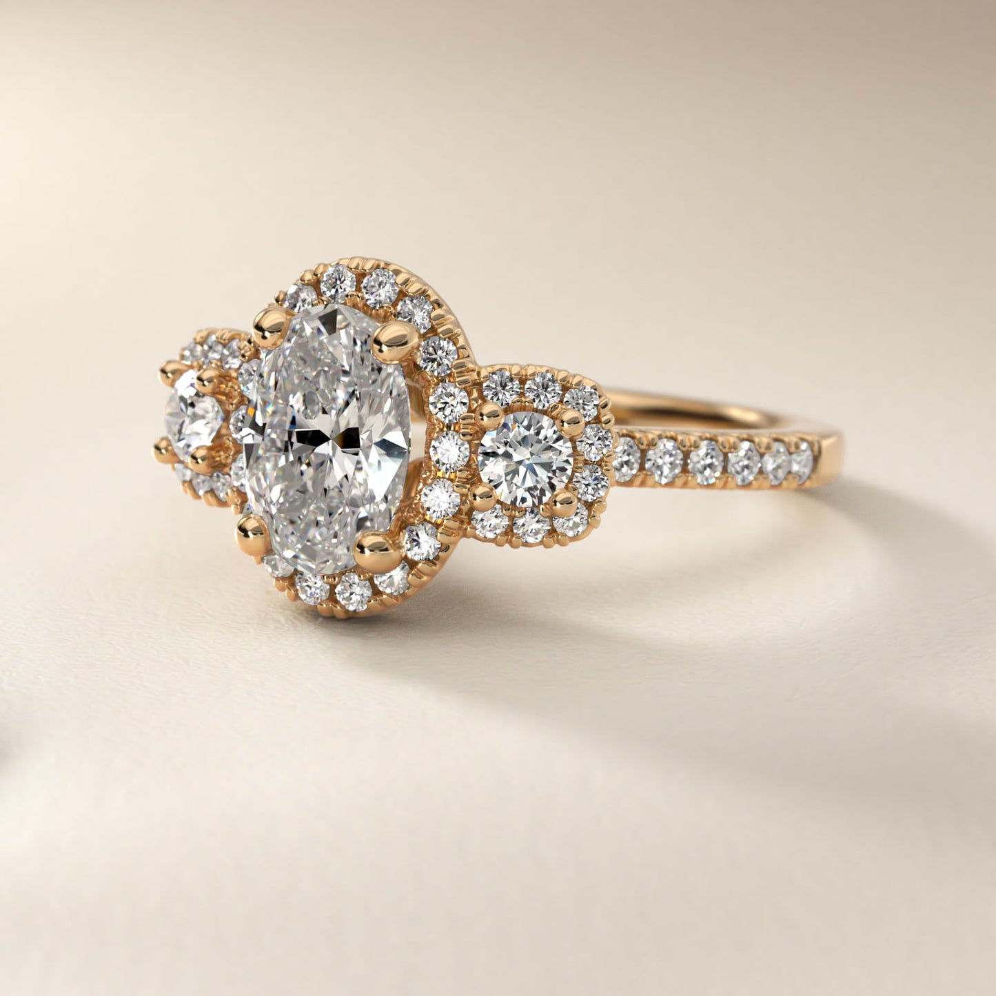 Three-Stone Cushion Halo Diamond Engagement Ring in 18k Yellow Gold - Oval Center