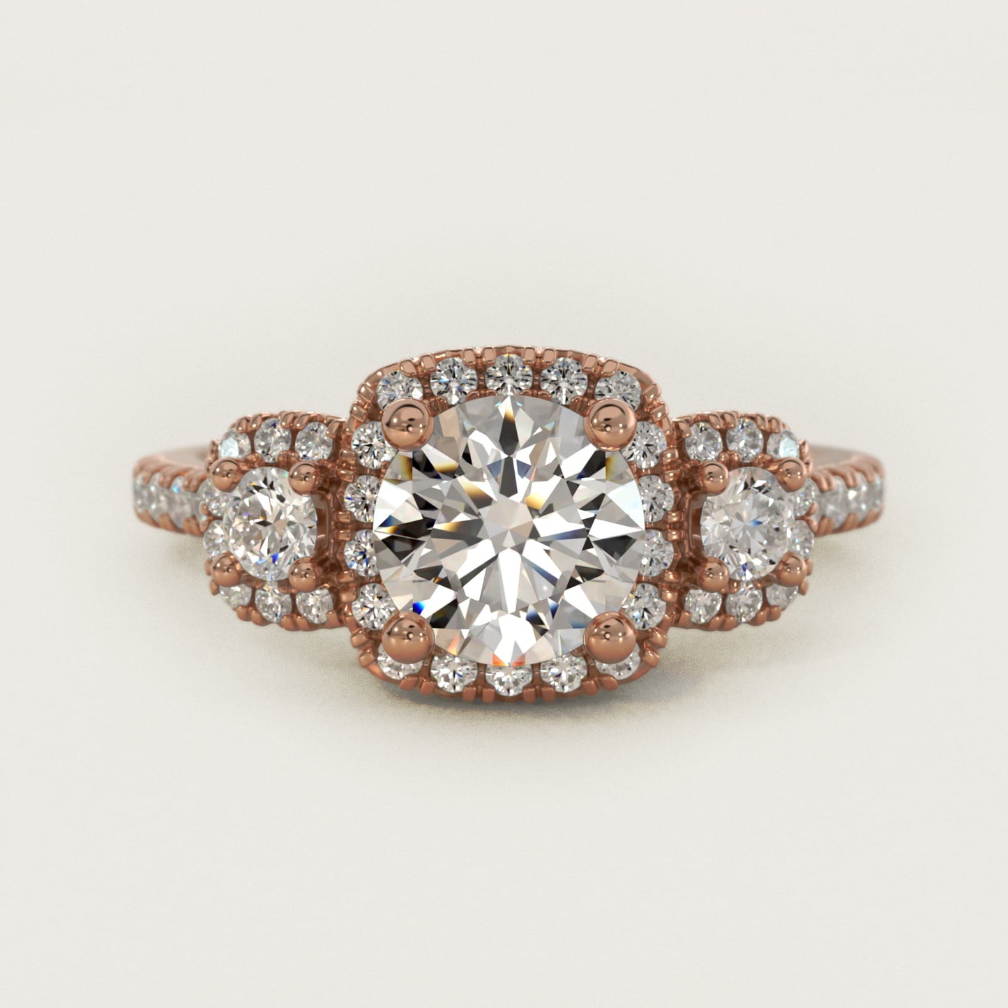 Three-Stone Cushion Halo Diamond Engagement Ring in 18k Rose Gold - Round Center