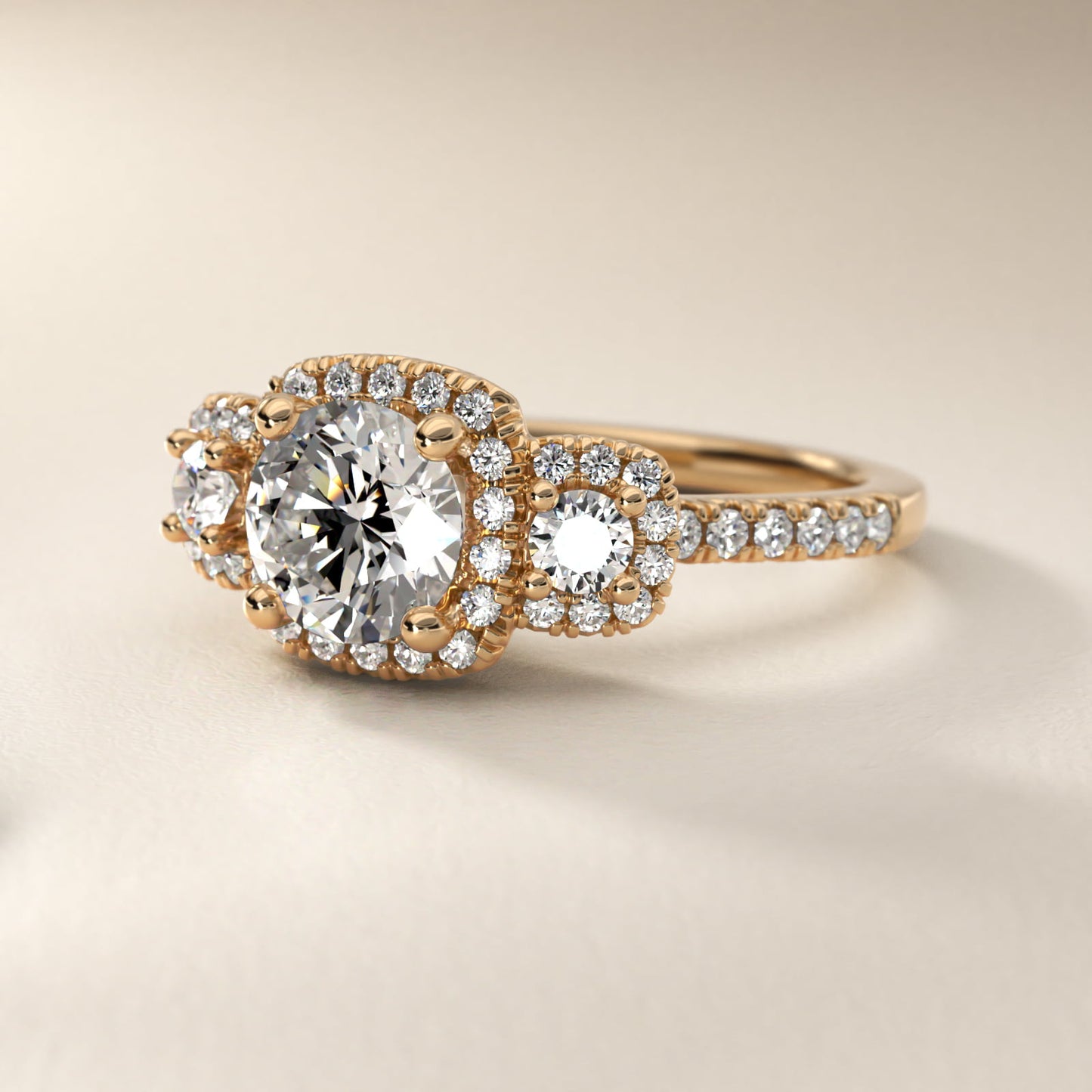 Three-Stone Cushion Halo Diamond Engagement Ring in 14k Yellow Gold - Round Center