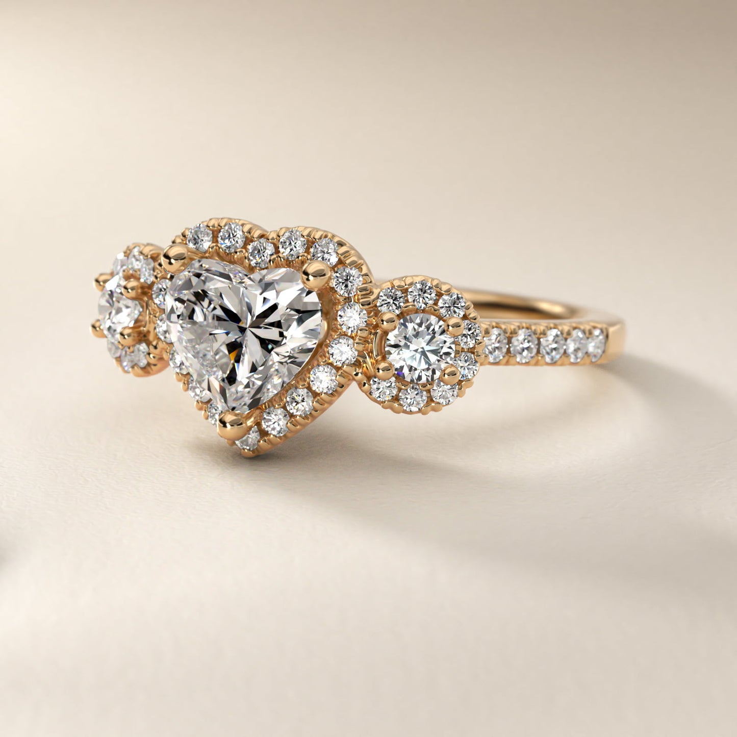 Three-Stone Halo Diamond Engagement Ring in 18k Yellow Gold - Heart Center