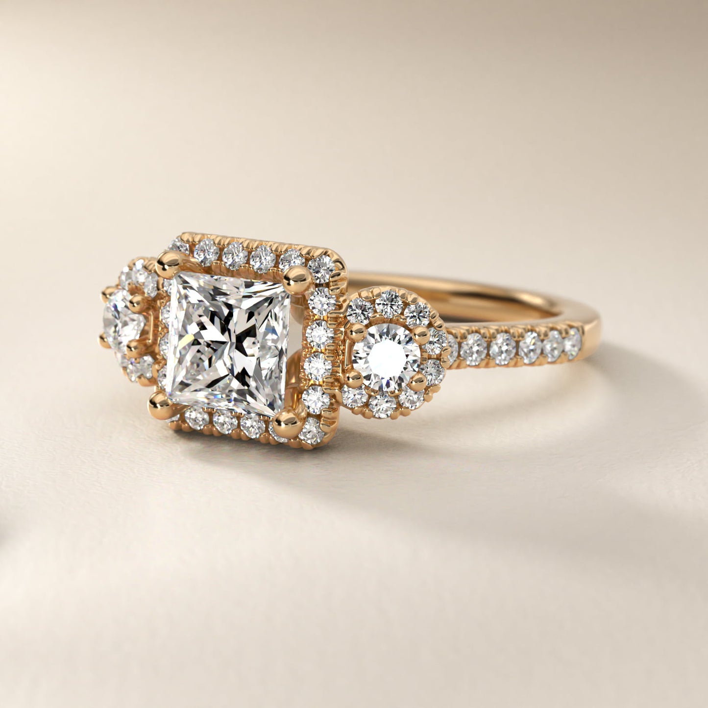 Three-Stone Halo Diamond Engagement Ring in 14k Yellow Gold - Princess Center