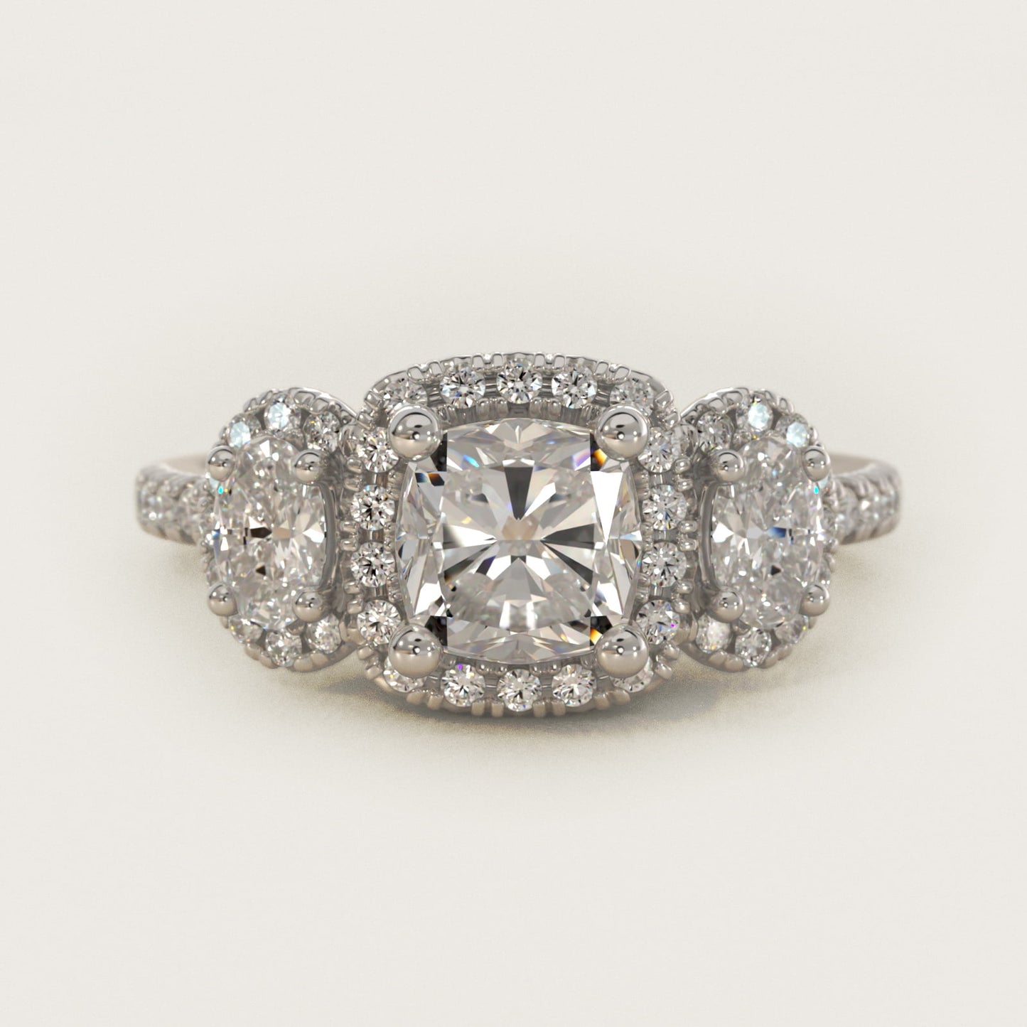 Three-Stone Oval Halo Diamond Engagement Ring in 18k White Gold - Cushion Center