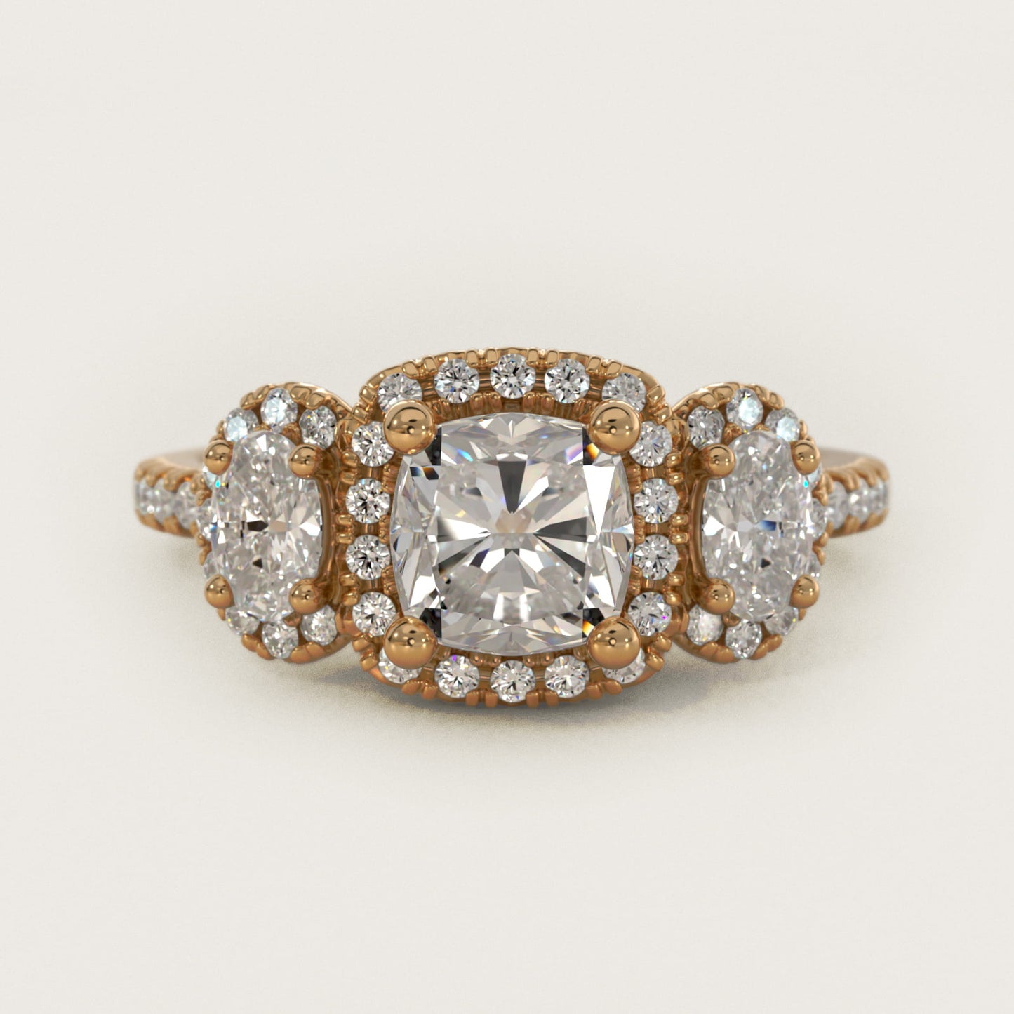 Three-Stone Oval Halo Diamond Engagement Ring in 18k Yellow Gold - Cushion Center