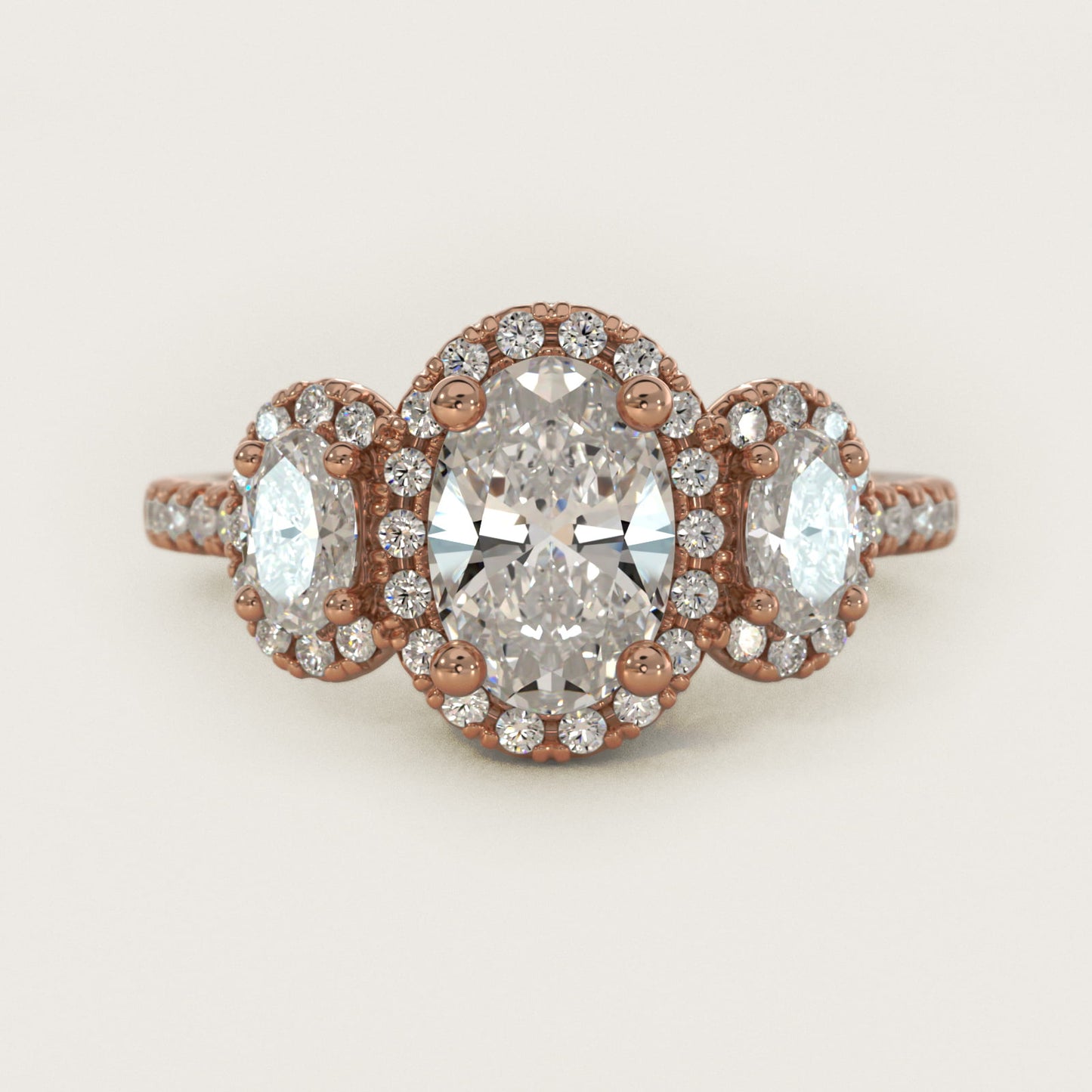 Three-Stone Oval Halo Diamond Engagement Ring in 18k Rose Gold - Oval Center