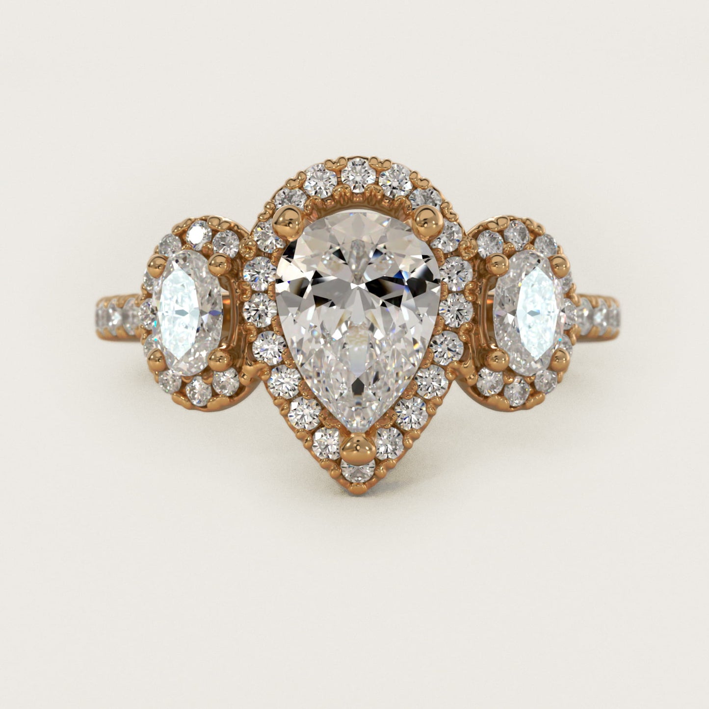 Three-Stone Oval Halo Diamond Engagement Ring in 14k Yellow Gold - Pear Center