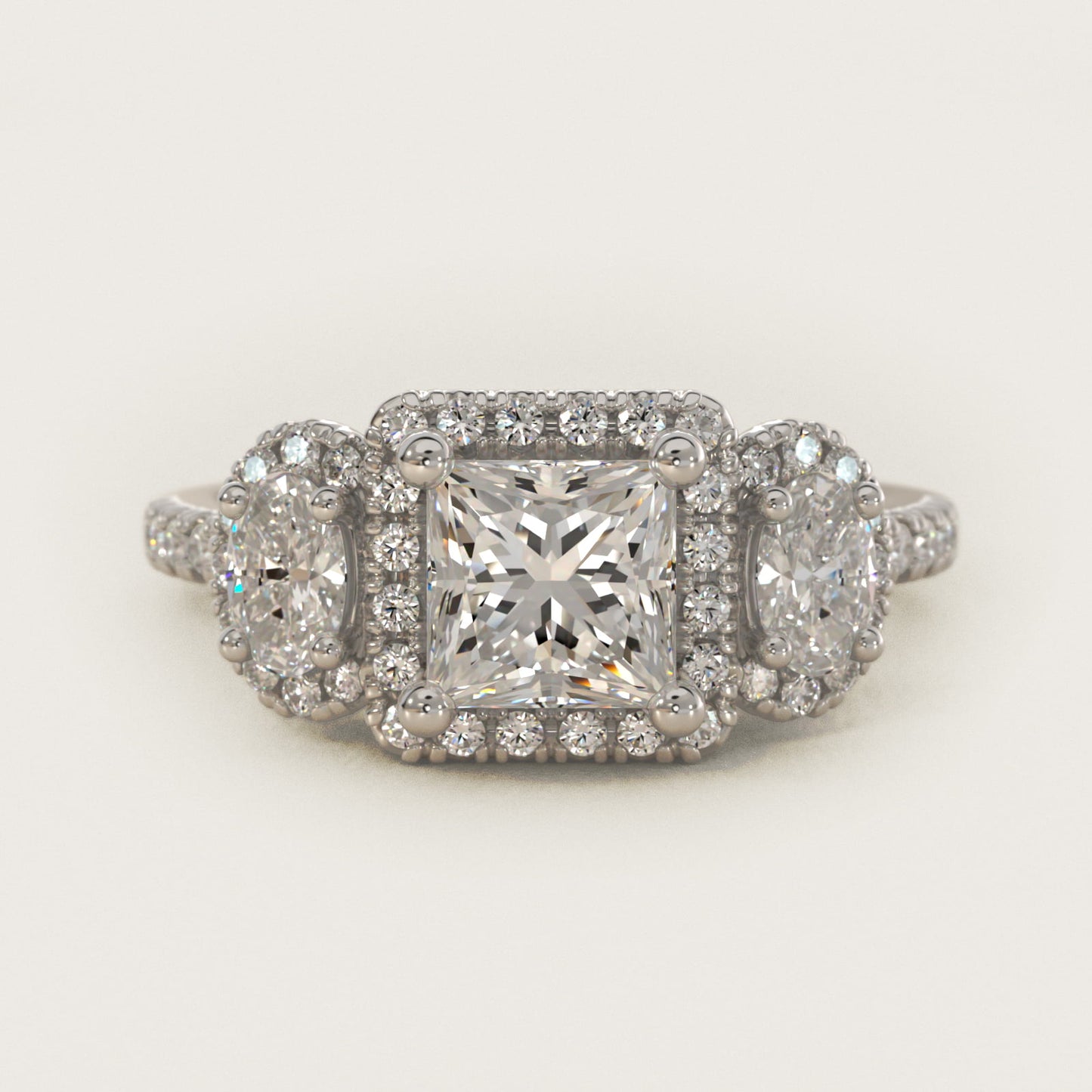 Three-Stone Oval Halo Diamond Engagement Ring in 18k White Gold - Princess Center
