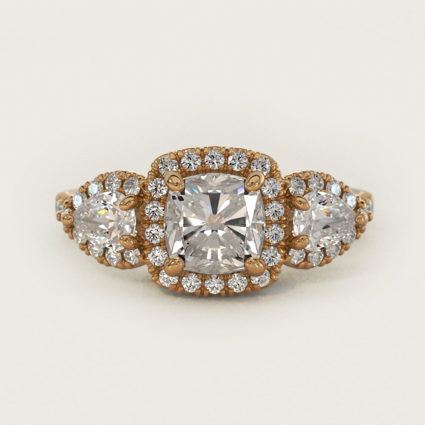Three-Stone Pear Halo Diamond Engagement Ring in 18k Yellow Gold - Cushion Center