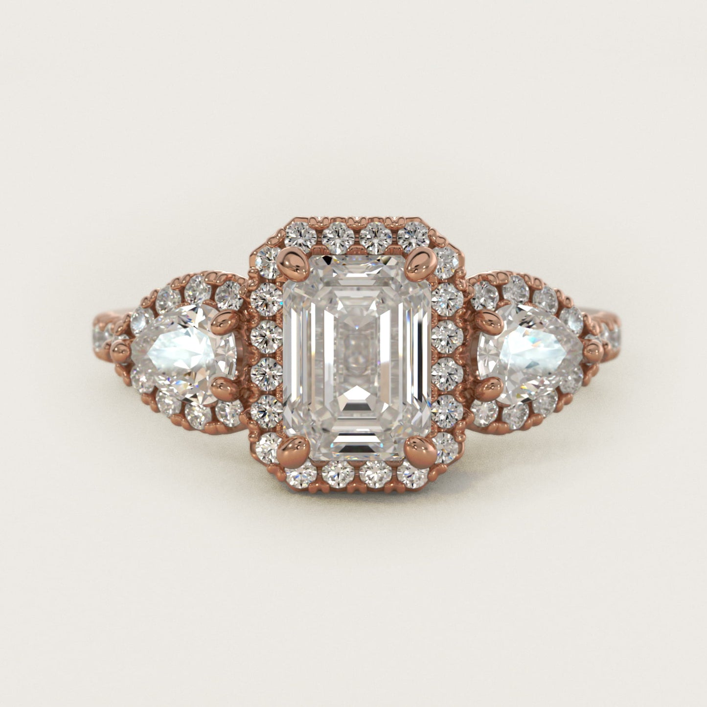 Three-Stone Pear Halo Diamond Engagement Ring in 14k Rose Gold - Emerald Center