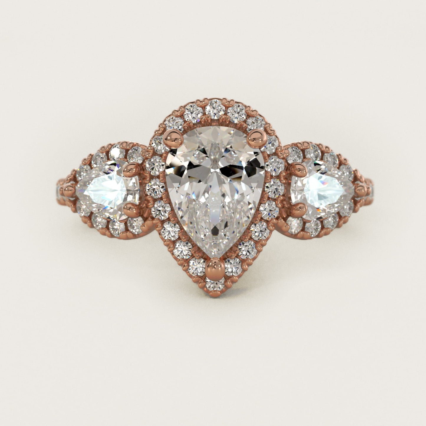 Three-Stone Pear Halo Diamond Engagement Ring in 18k Rose Gold - Pear Center