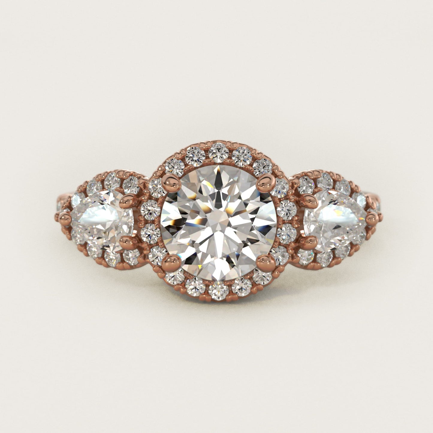 Three-Stone Pear Halo Diamond Engagement Ring in 14k Rose Gold - Round Center