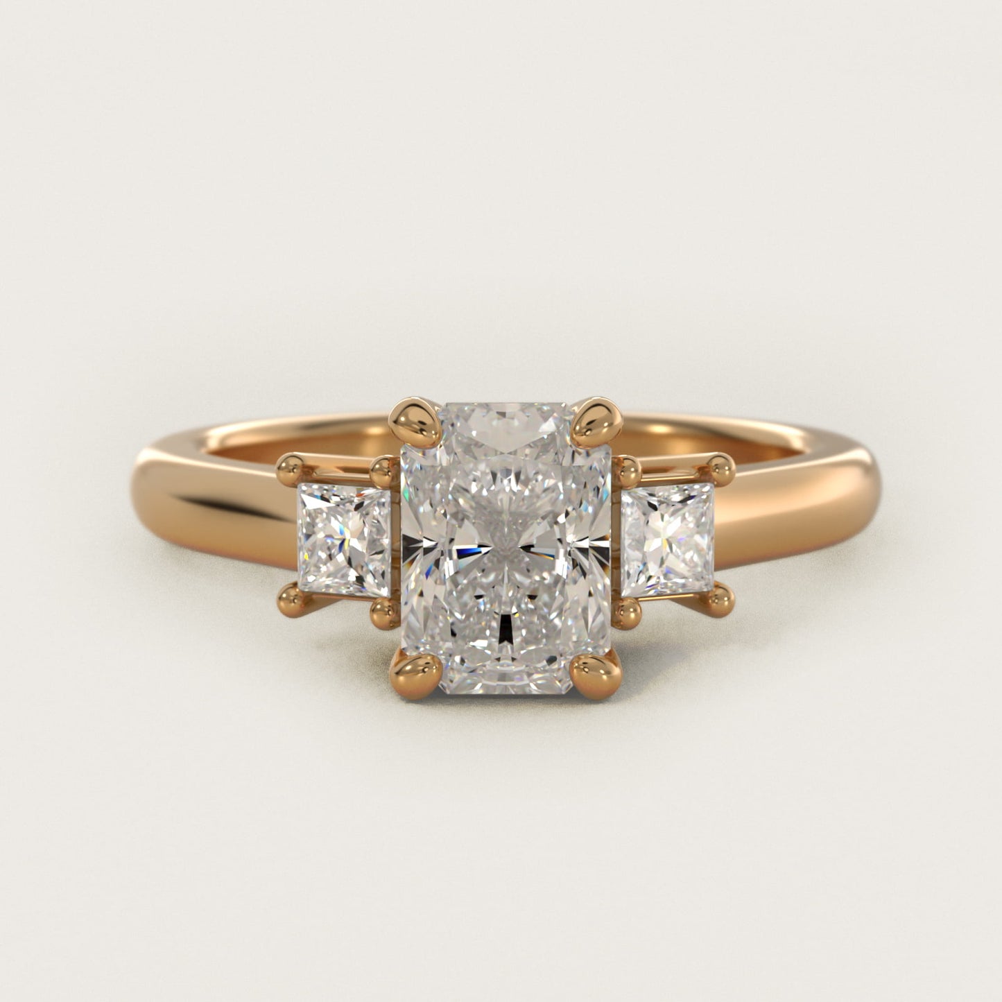 Three-Stone Princess Diamond Engagement Ring in 18k Yellow Gold (1/3 ct. tw.) - Radiant Center