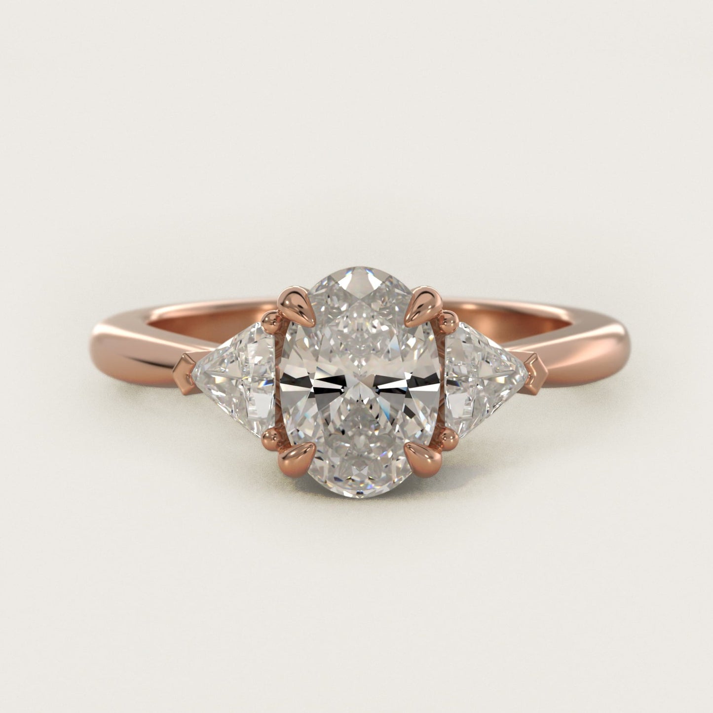 Three-Stone Trillion Diamond Engagement Ring in 18k Rose Gold (1/3 ct. tw.) - Oval Center