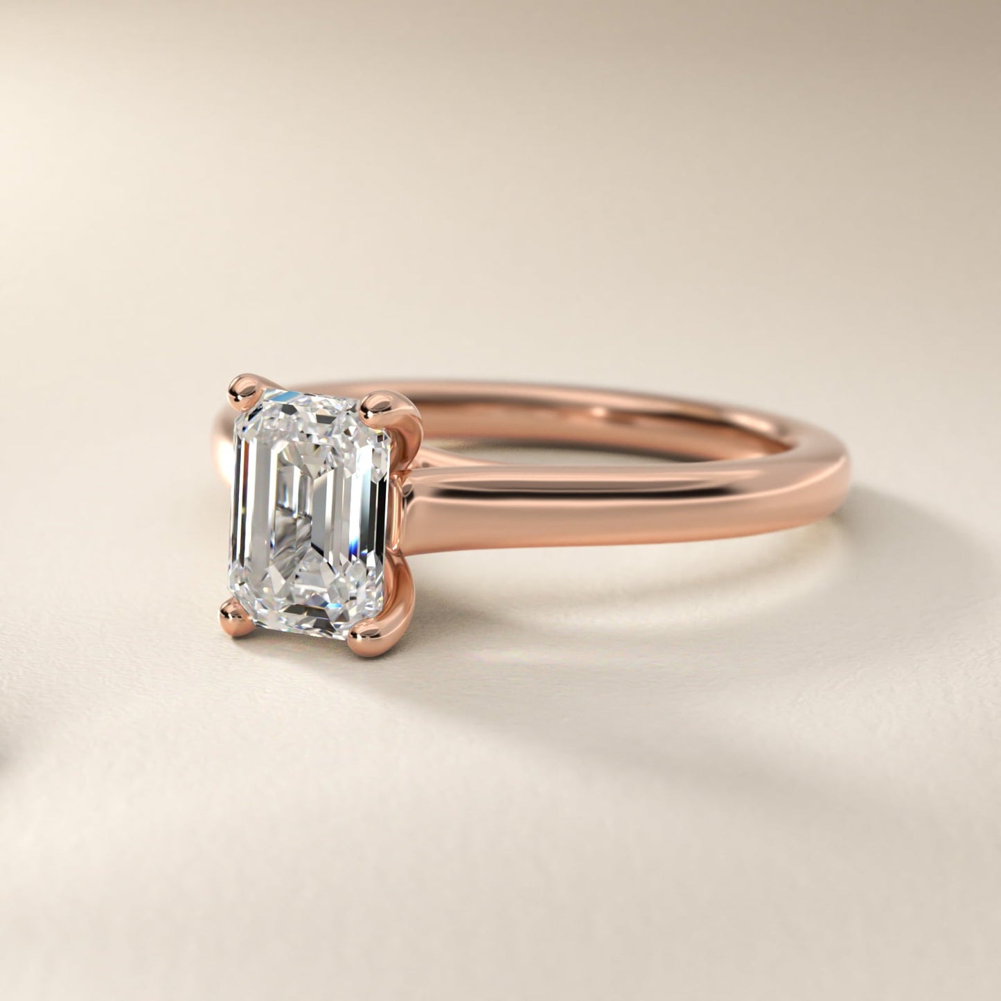 Twist Bridge Solitaire Engagement Ring in 18k Rose Gold - Emerald Center