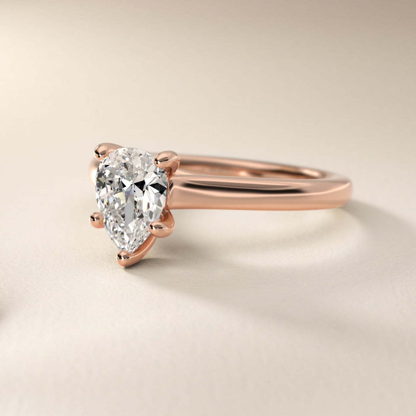 Twist Bridge Solitaire Engagement Ring in 18k Rose Gold - Pear Center