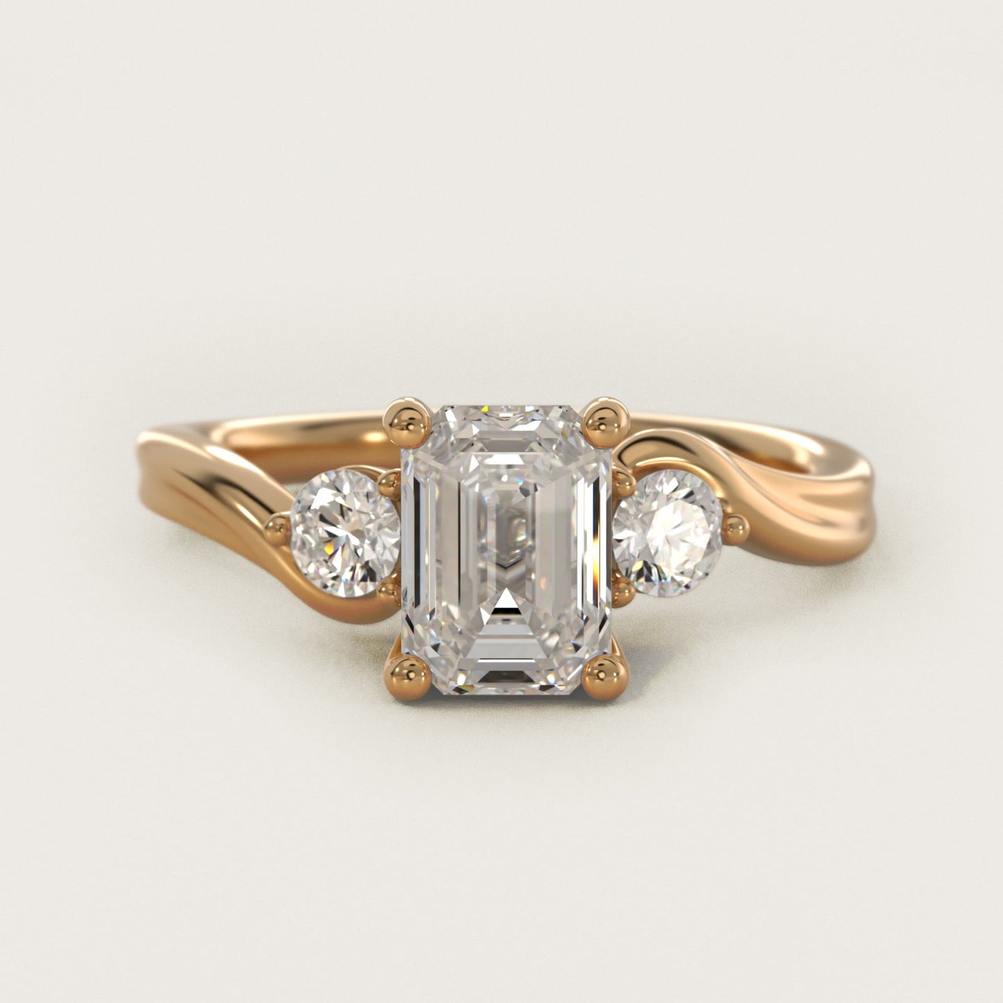 Wrapped Shank Three Stone Diamond Engagement Ring in 14k Yellow Gold - Emerald Center