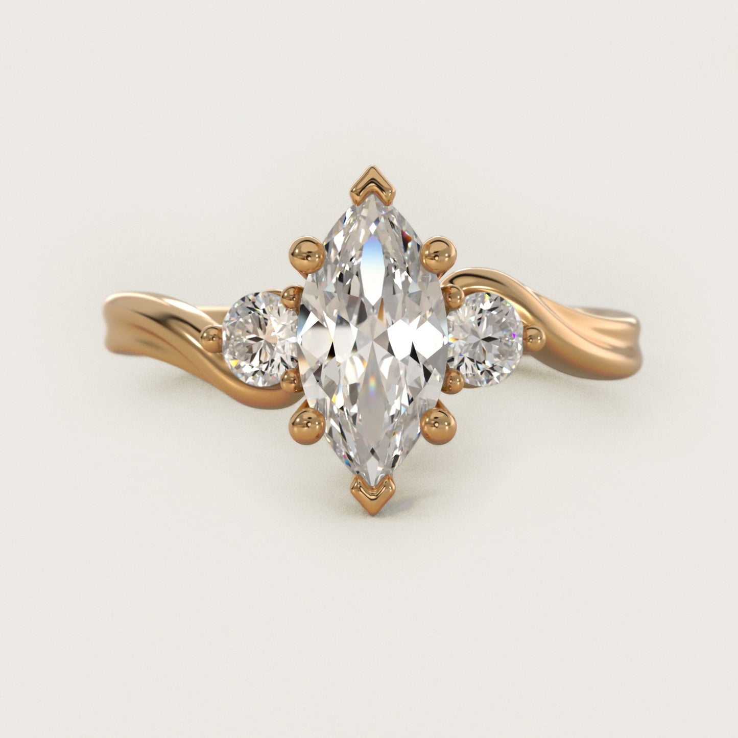 Wrapped Shank Three Stone Diamond Engagement Ring in 14k Yellow Gold - Marquise Center