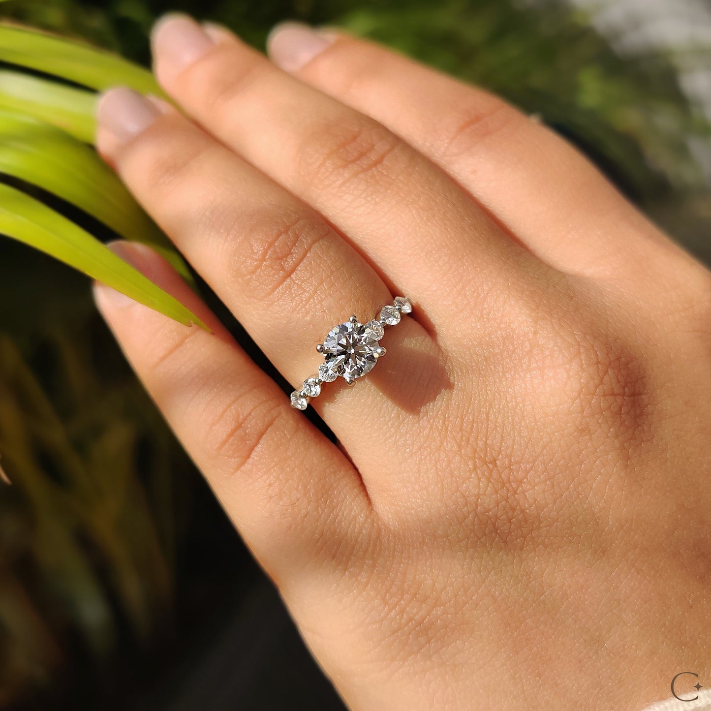 Round Brilliant Cut Diamond Ring With Round Cut Side Stones