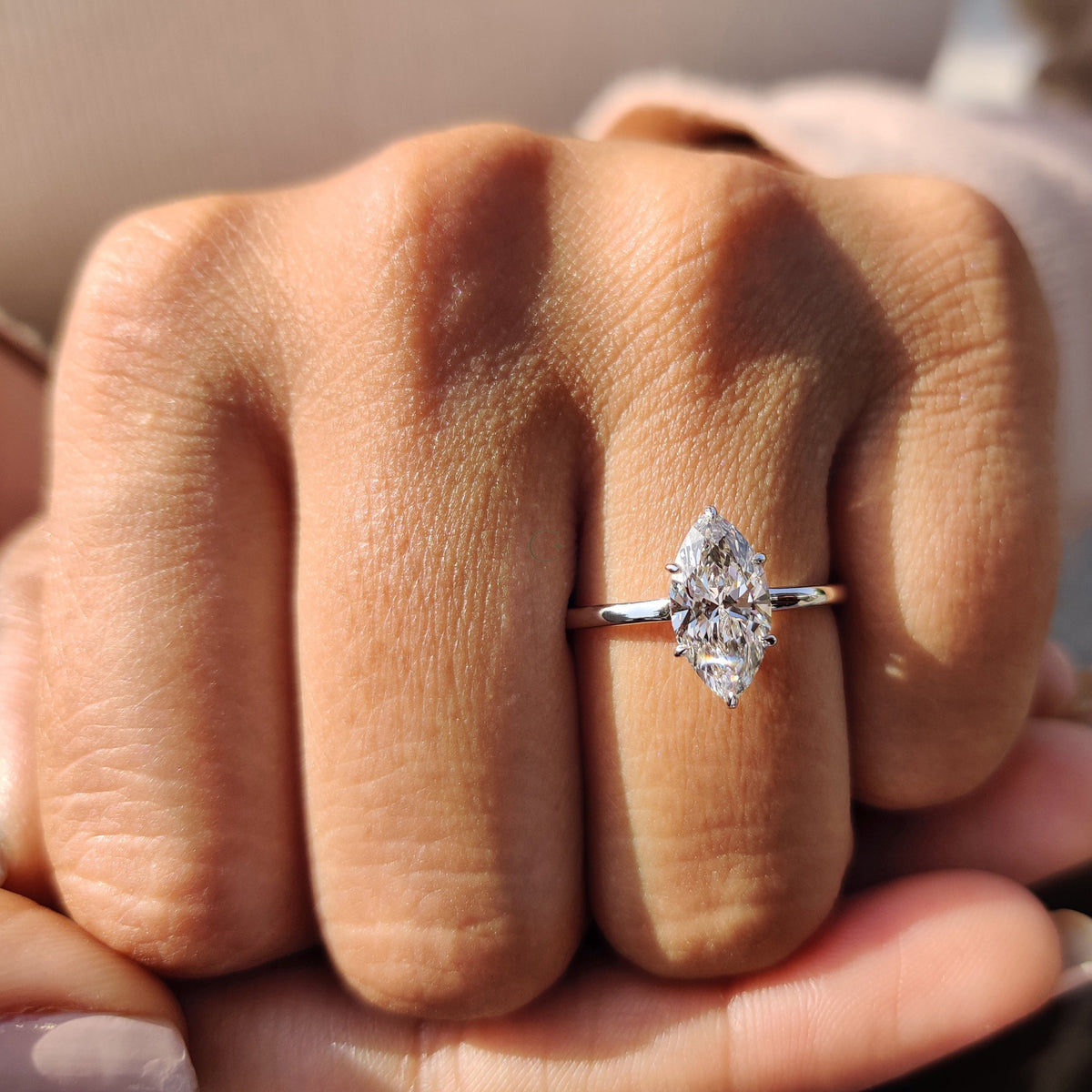 Marquise Cut Engagement Ring with Open Gallery Design