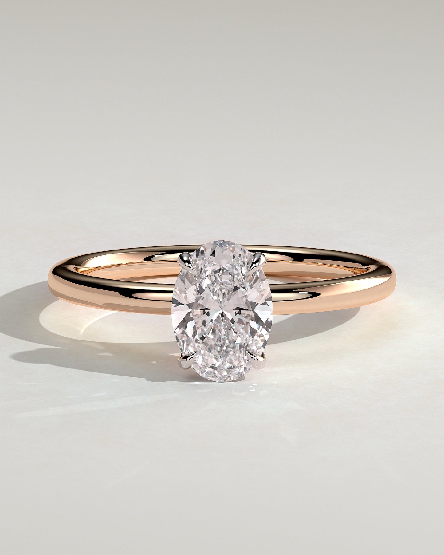 Daisy - Classic Oval Claw Solitaire Engagement Ring - Rose Two-Tone