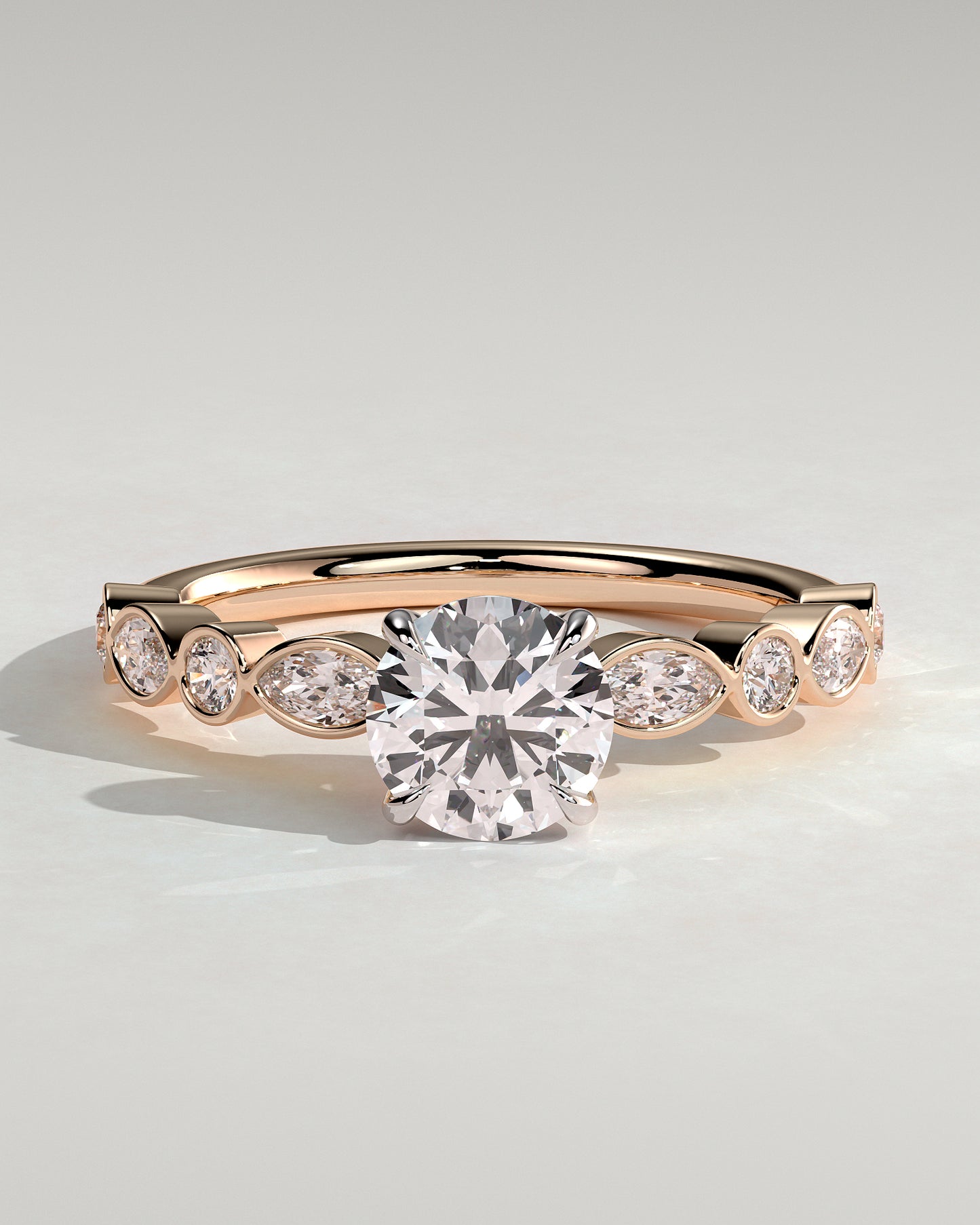 Cartia - Round Claw Solitaire with Round-Marquise Bezel Accent Stones Engagement Ring - Rose Two-Tone