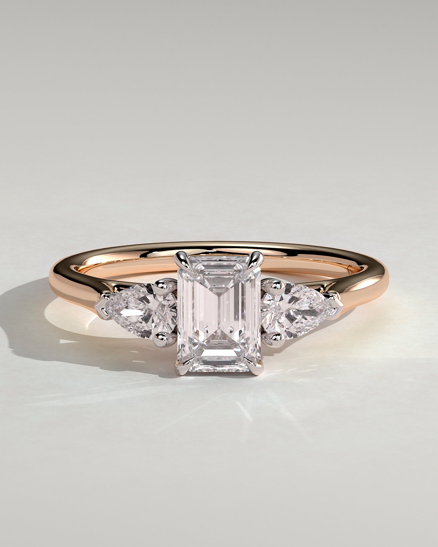 Davina - Emerald Claw Trilogy with Pear Side Stones and Cathedral Setting Engagement Ring - Rose Two-Tone