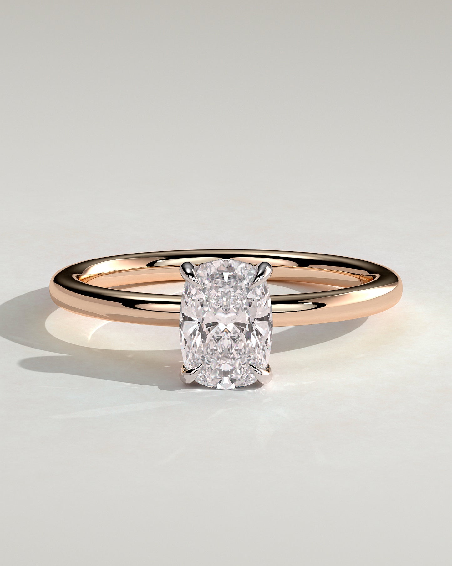 Ava - Elongated Cushion Claw Solitaire with Hidden Halo Engagement Ring - Rose Two-Tone