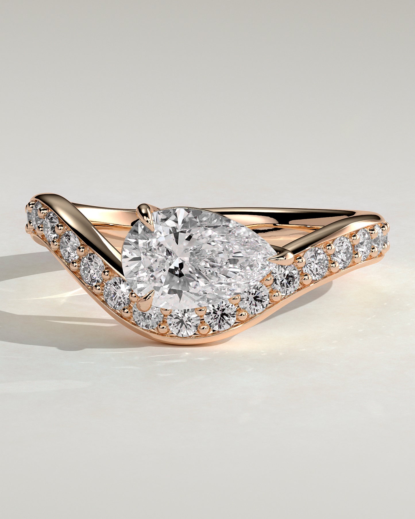 Eliza - Pear Claw Solitaire with Bead Set Pave Wave Band and East West Setting Engagement Ring - Rose Gold