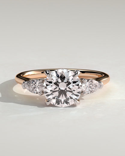 Arya - Round Claw Trilogy with Pear Side Stones and Cathedral Setting Engagement Ring - Rose Two-Tone