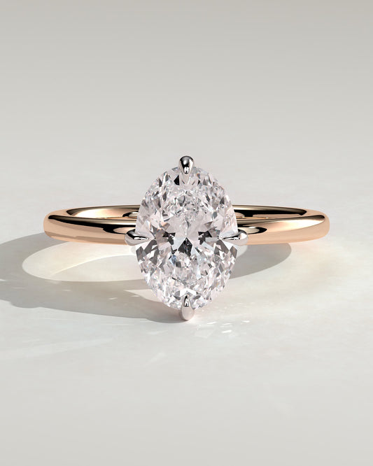 Spencer - Oval Claw Solitaire with Hidden Halo and Compass Rotation  Engagement Ring - Rose Two-Tone